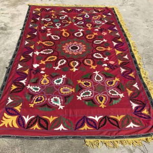 yellow tassel suzani