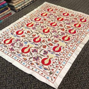 white silk suzani