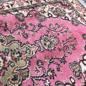 faded pink rug