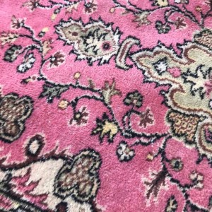 faded pink rug
