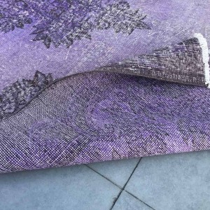 purple overdyed rug