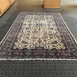 faded oushak rug