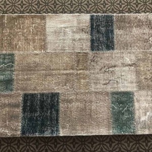 gray patcwork rug