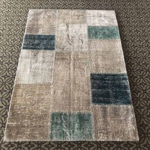 gray patcwork rug